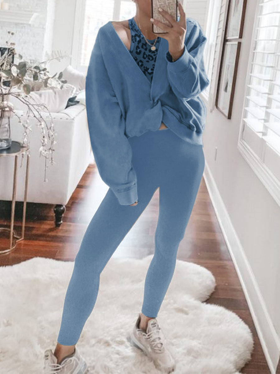 Two-piece Suit with Fashionable Top and Solid Color Tights